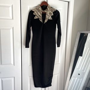 Elegant black dress with gold embellishments - size Medium (no tag). Never worn